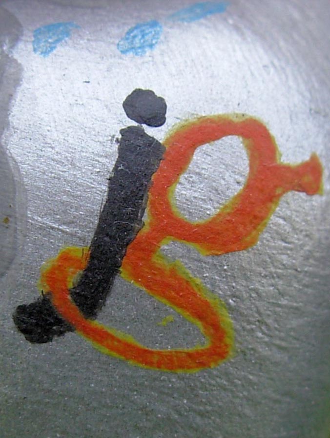 The Josh Groban logo--his initials, a black letter j and an orange g