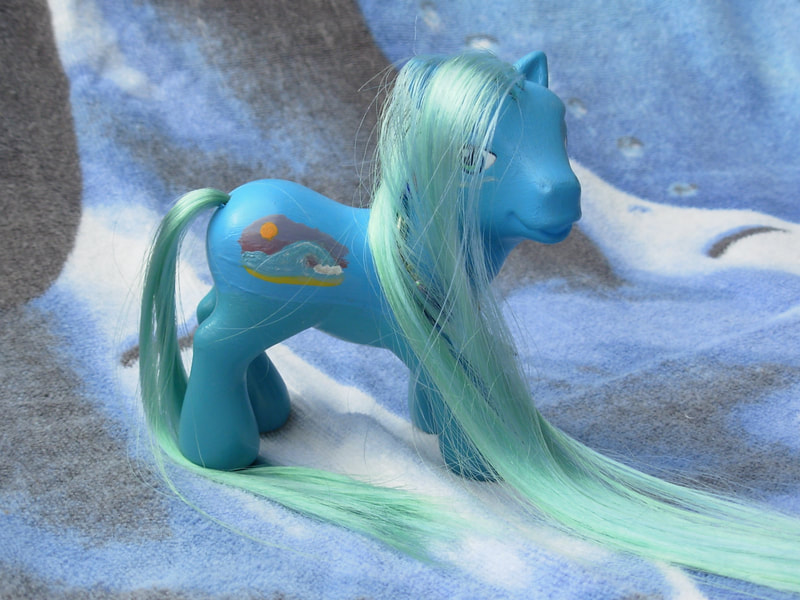 A teal-blue gradient G3 MLP with pale green hair, blue-green eyes, a silver wave cheek tattoo, and a wave crashing on the beach at sunset as his cutie mark. 